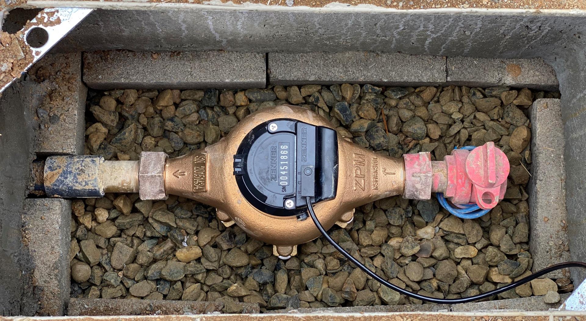 installed Water Meter in box with lid off