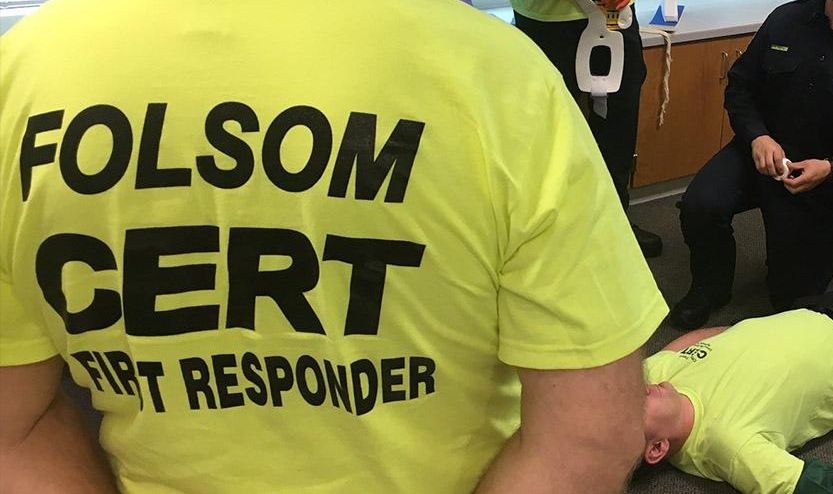 folsom cert first responder training photo of shirt and the instructor and a volunteer leading through the exercise