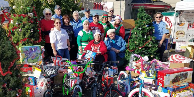 Toy Drive toys and police staff who helped collect it