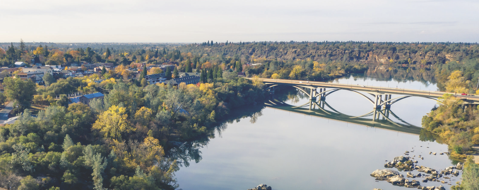 River Dstrict image with lake natoma, lake natoma crossing bridge and the historic district